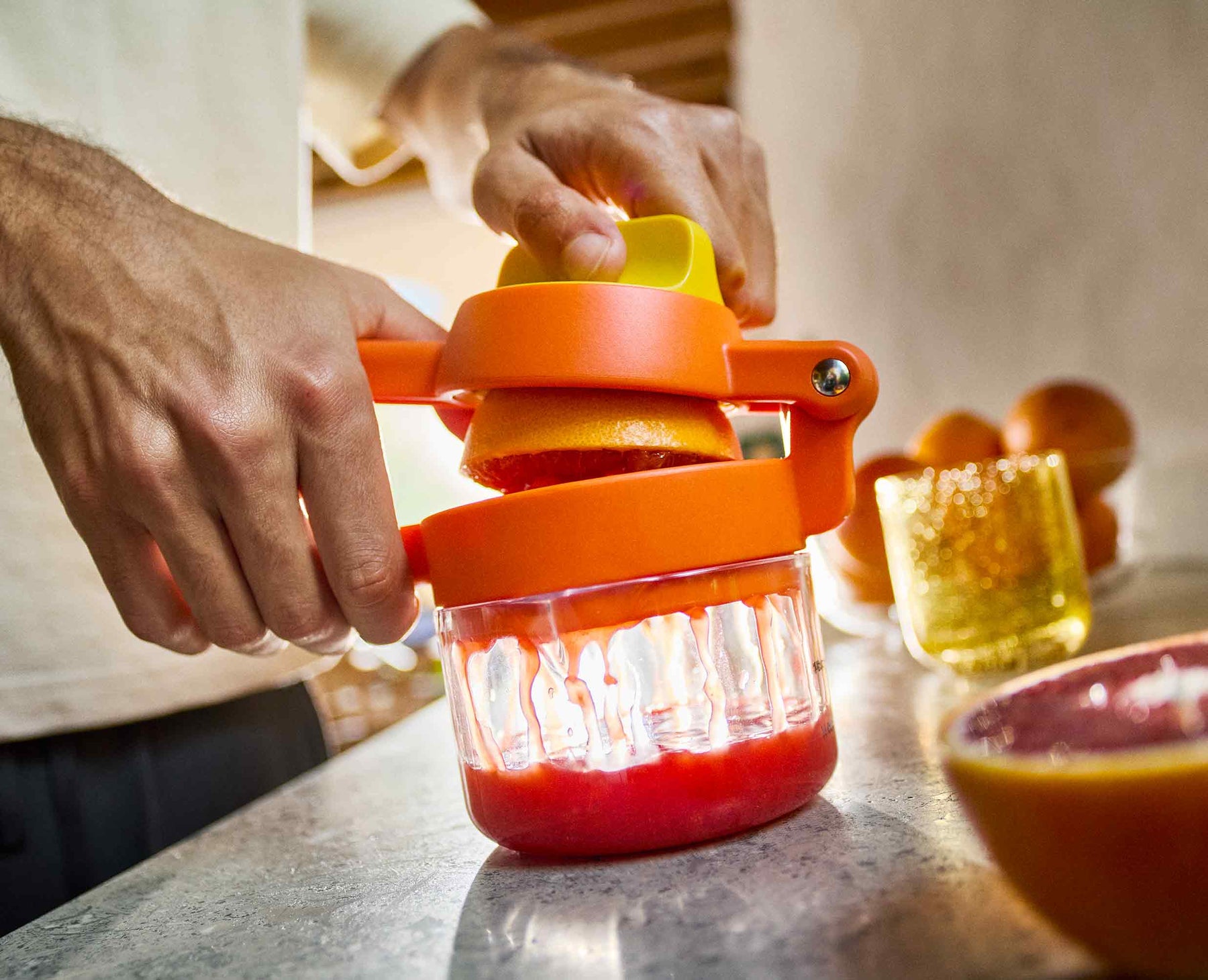 JuiceMax™ Plus Dual-Action Orange Citrus Press with Measuring Cup