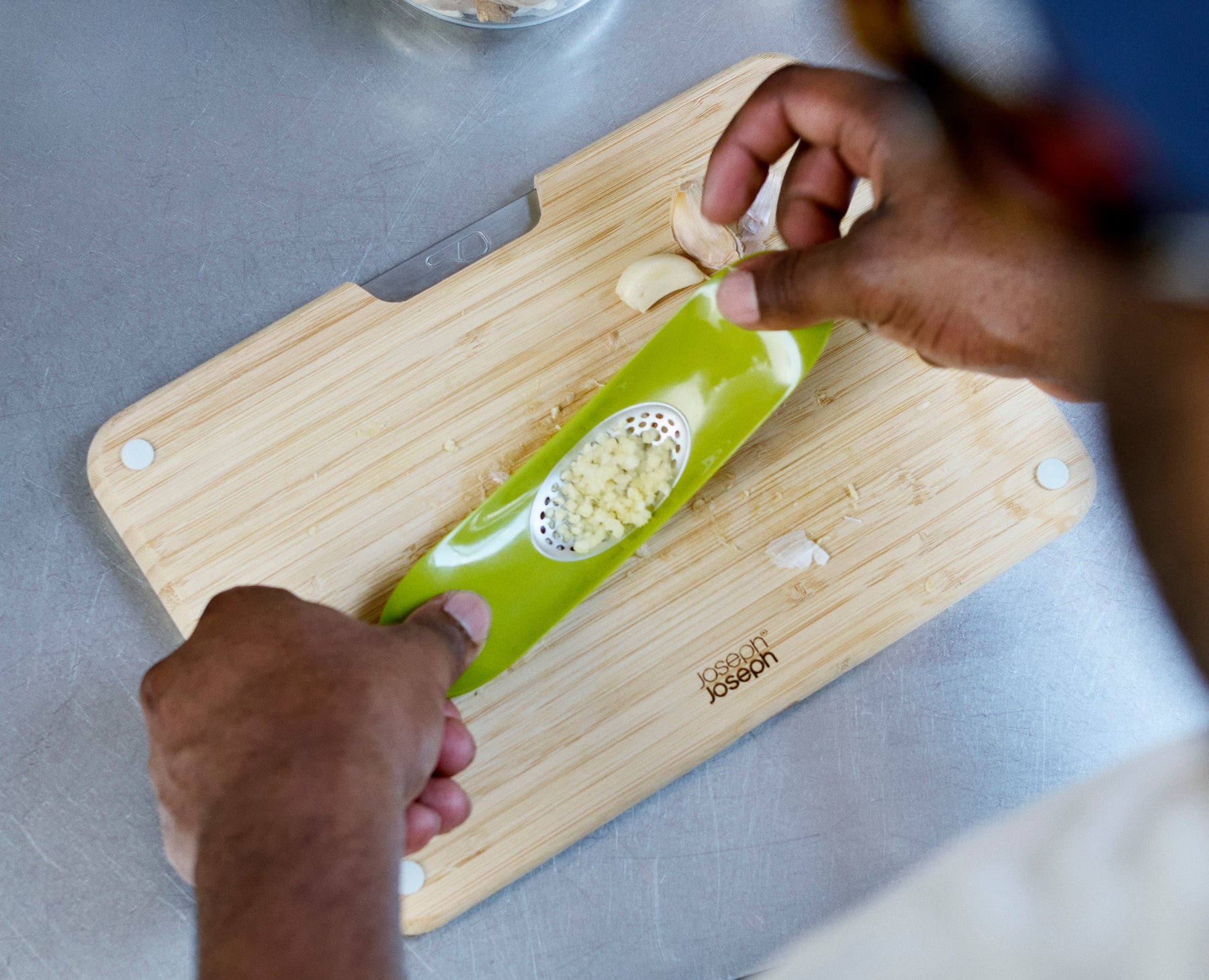 Rocker™ Green Garlic Crusher