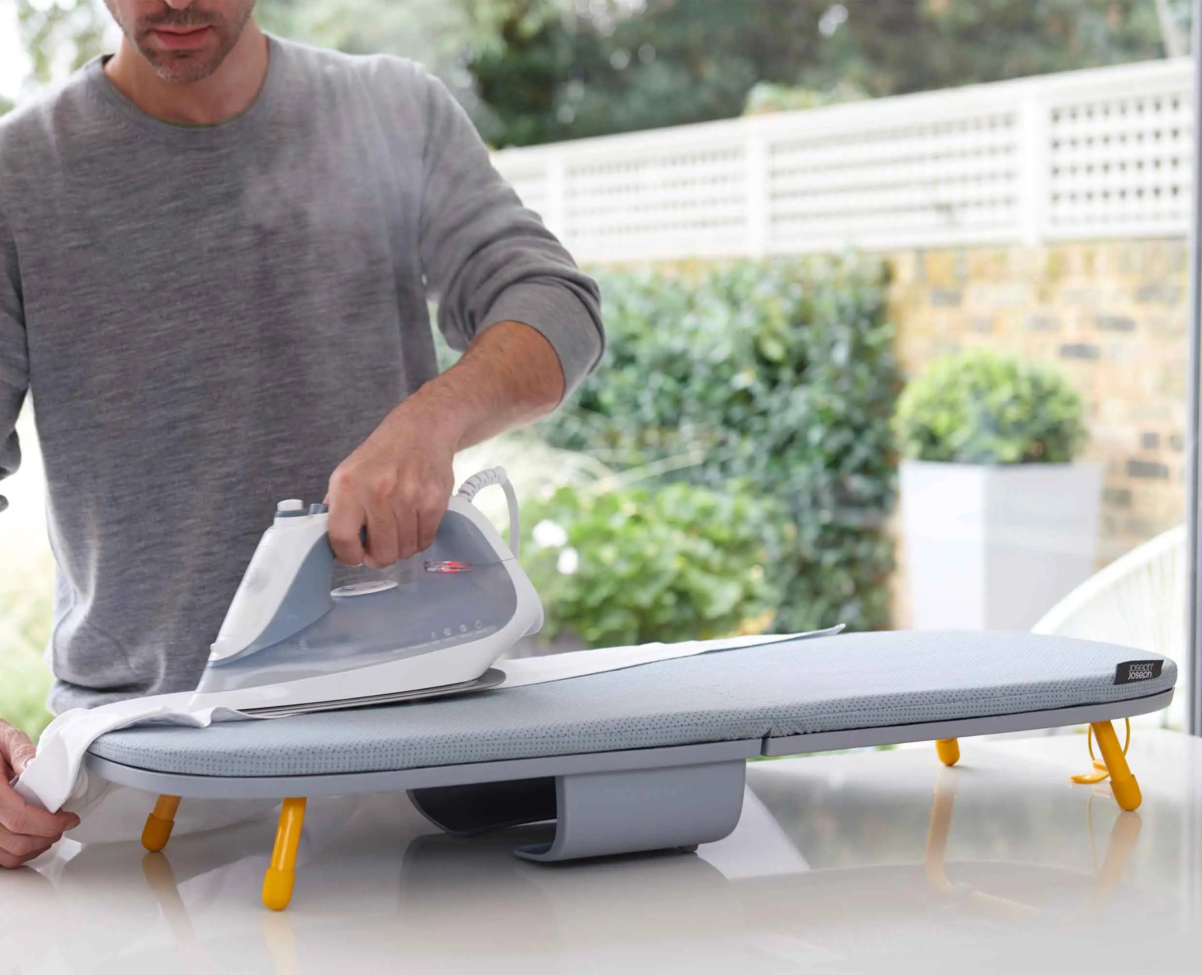 Ironing board folding deals